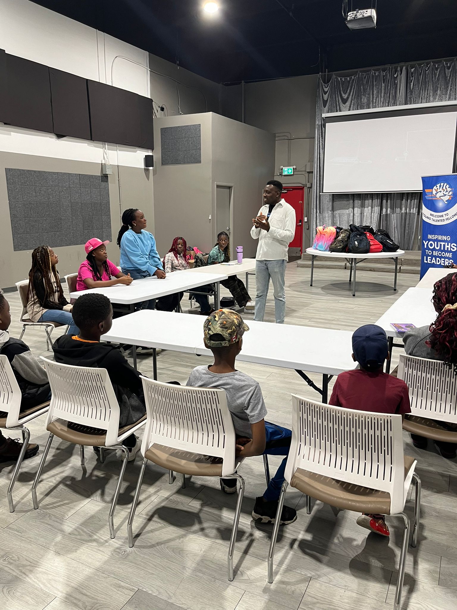 Youthful man taking a lecture